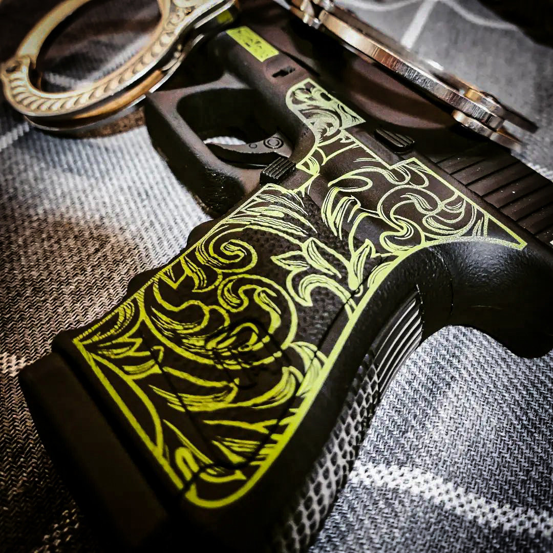 Engraved handgun